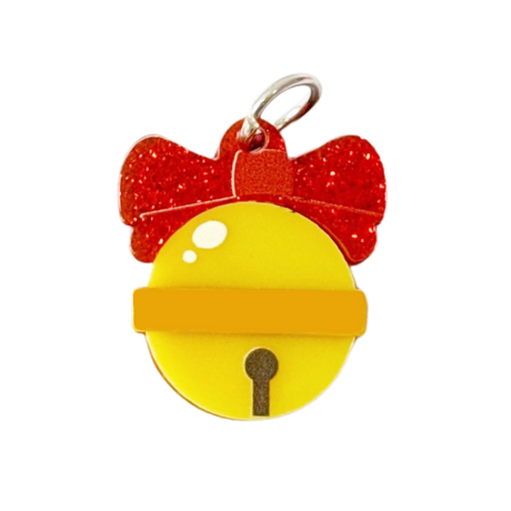 A festive Christmas bell charm with a yellow body, a red glitter bow, and a gold-colored bell keyhole detail.